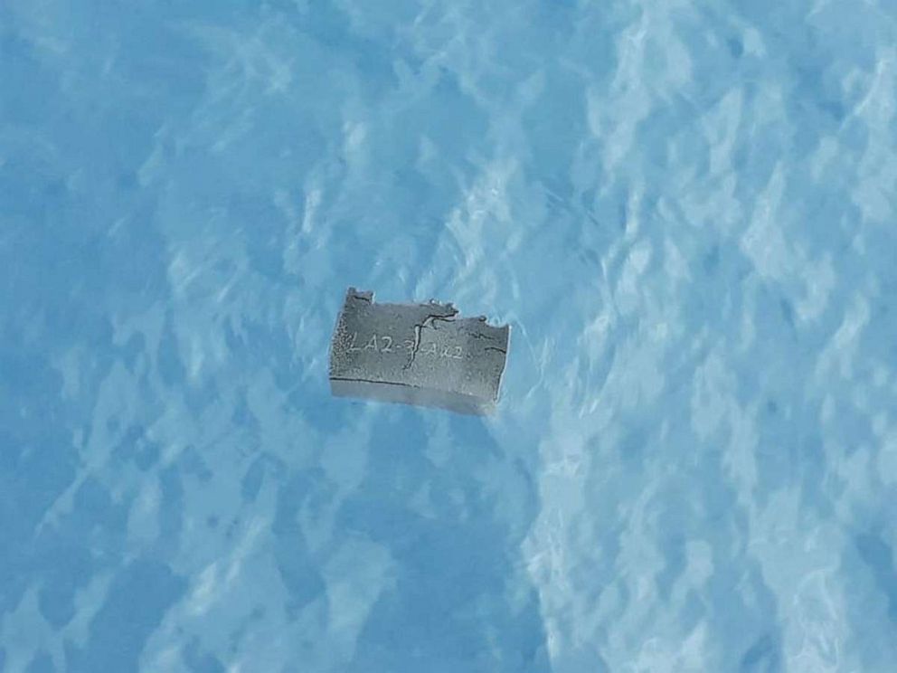 PHOTO: A handout photo released by the Chilean Air Force on Dec. 11, 2019, shows a part of a fuel tank, allegedly from the C-130 Hercules military transport plane that went missing with 38 people aboard, found at sea near Chile.