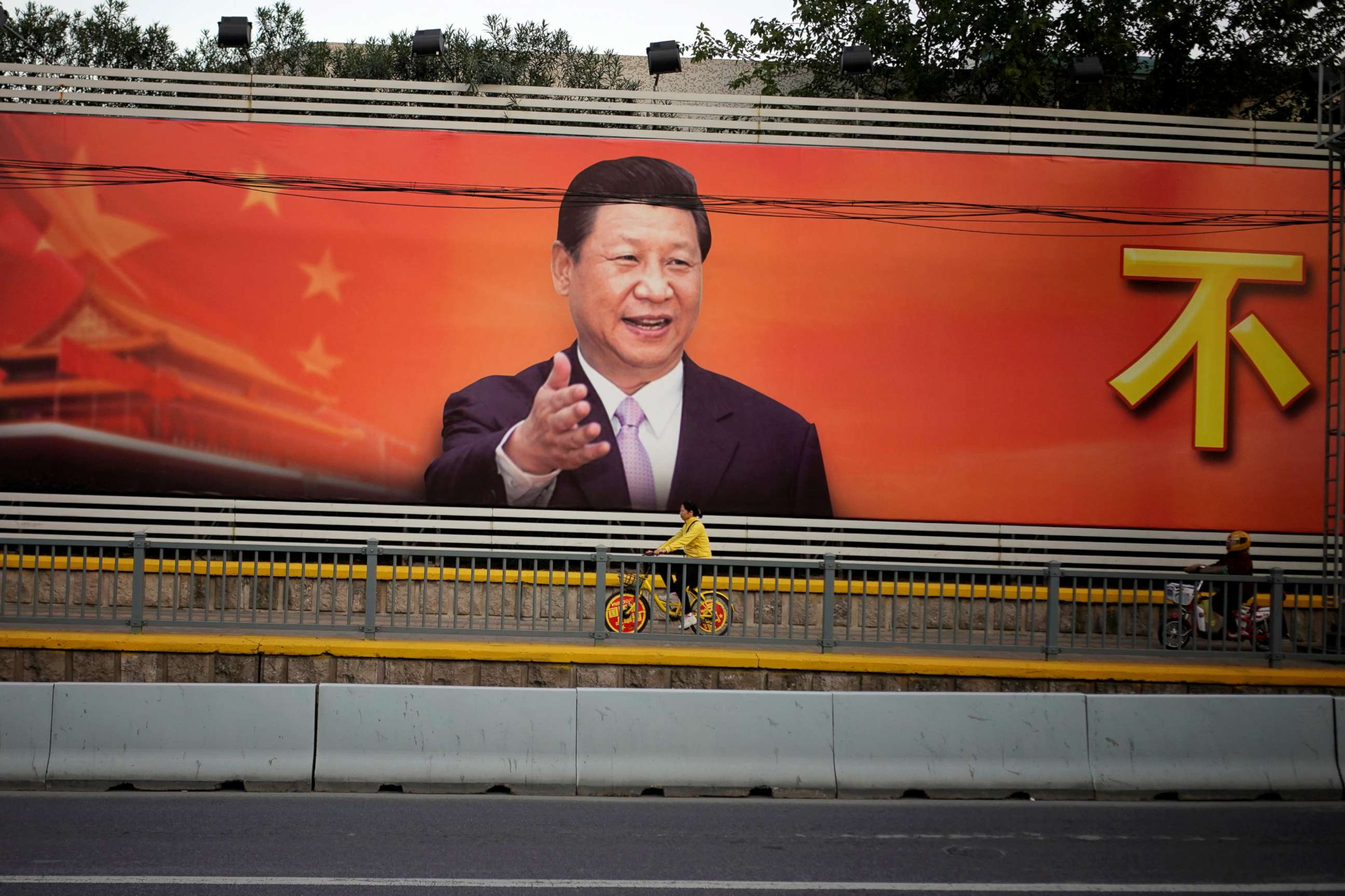 PHOTO: A poster with a portrait of Chinese President Xi Jinping is displayed along a street in Shanghai, China, Oct. 24, 2017. 