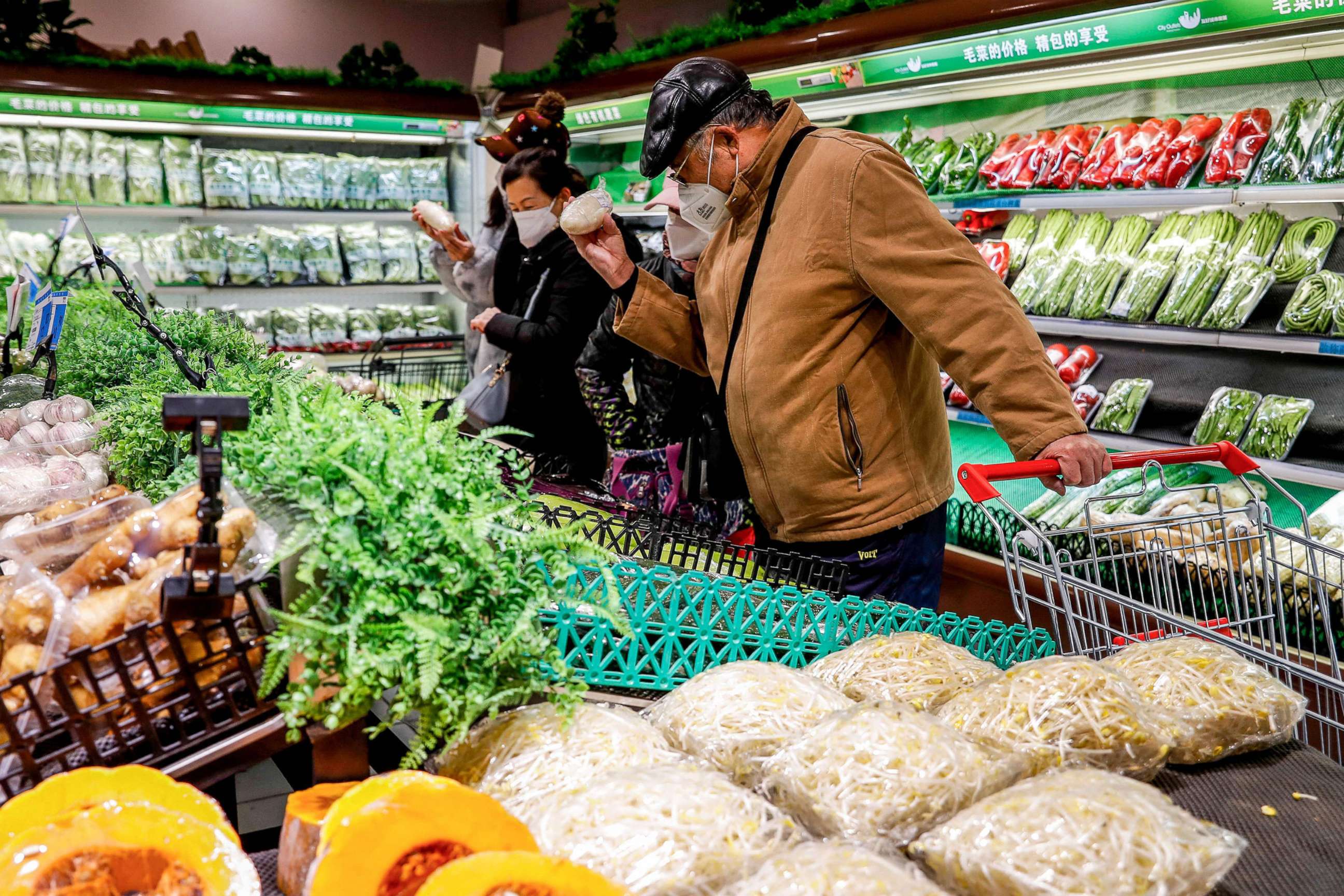 PHOTO: Shoppers are pictured at a supermarket in Urumqi, in China's northwestern Xinjiang region, following the easing of Covid-19 restrictions in the city, Dec. 5, 2022.