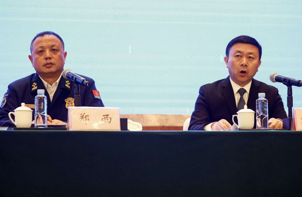 PHOTO: Zheng Xi, chief of the Fire and Rescue Corps of Guangxi Zhuang Autonomous Region, and Liu Xiaodong, an official with China Eastern Airlines, attend a news conference, March 24, 2022, after a China Eastern Airlines Boeing 737-800 plane crash.