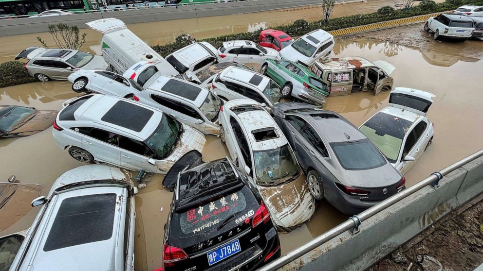 PHOTO: Cars sit in floodwaters after heavy rains hit the city of Zhengzhou in China, July 21, 2021.
