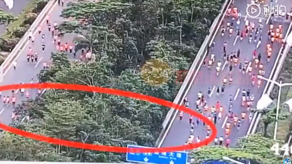PHOTO: A traffic camera caught runners at a half-marathon in Shenzhen, China, cutting through foliage, shaving off about a mile and a half from the run, Chinese state news agency Xinhua reported on Nov. 29, 2018.