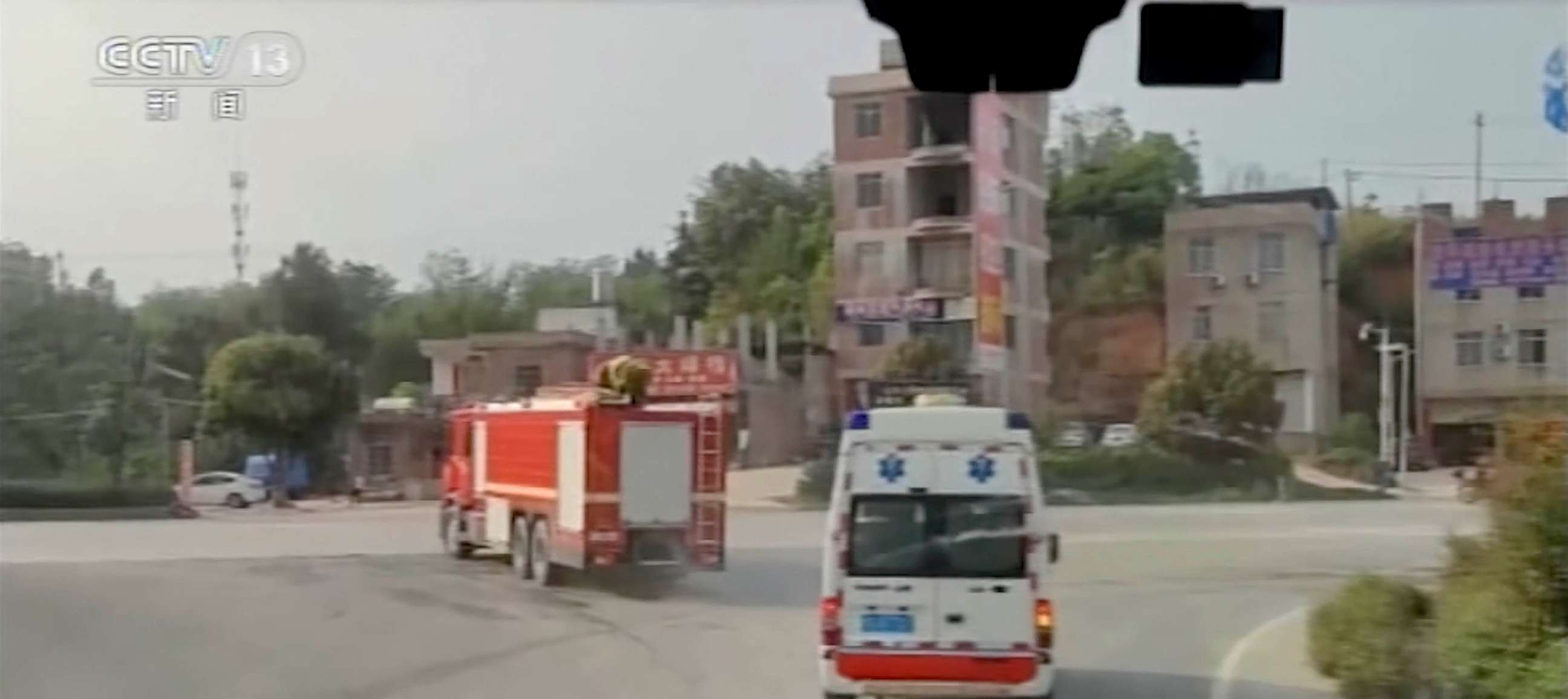 PHOTO: In this image taken from video footage run by China's CCTV, emergency personnel travel to the site of a plane crash near Wuzhou in southwestern China's Guangxi Zhuang Autonomous Region, March 21, 2022.