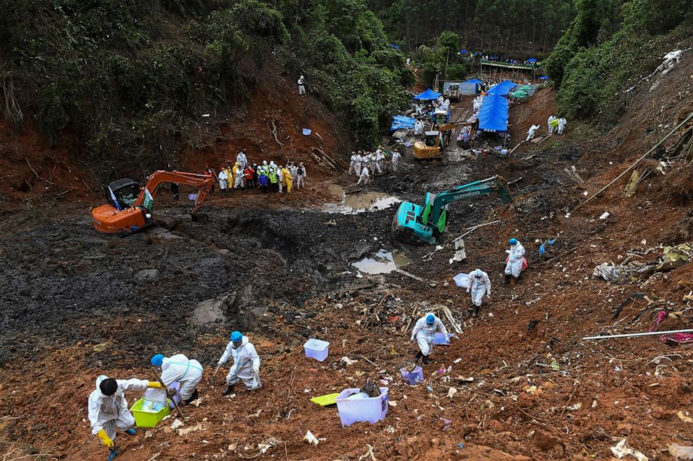 PHOTO: In this photo released by Xinhua News Agency, search and rescuer workers conduct continued search operations at the China Eastern flight crash site in Tengxian County on March 26, 2022, in southern China's Guangxi Zhuang Autonomous Region.