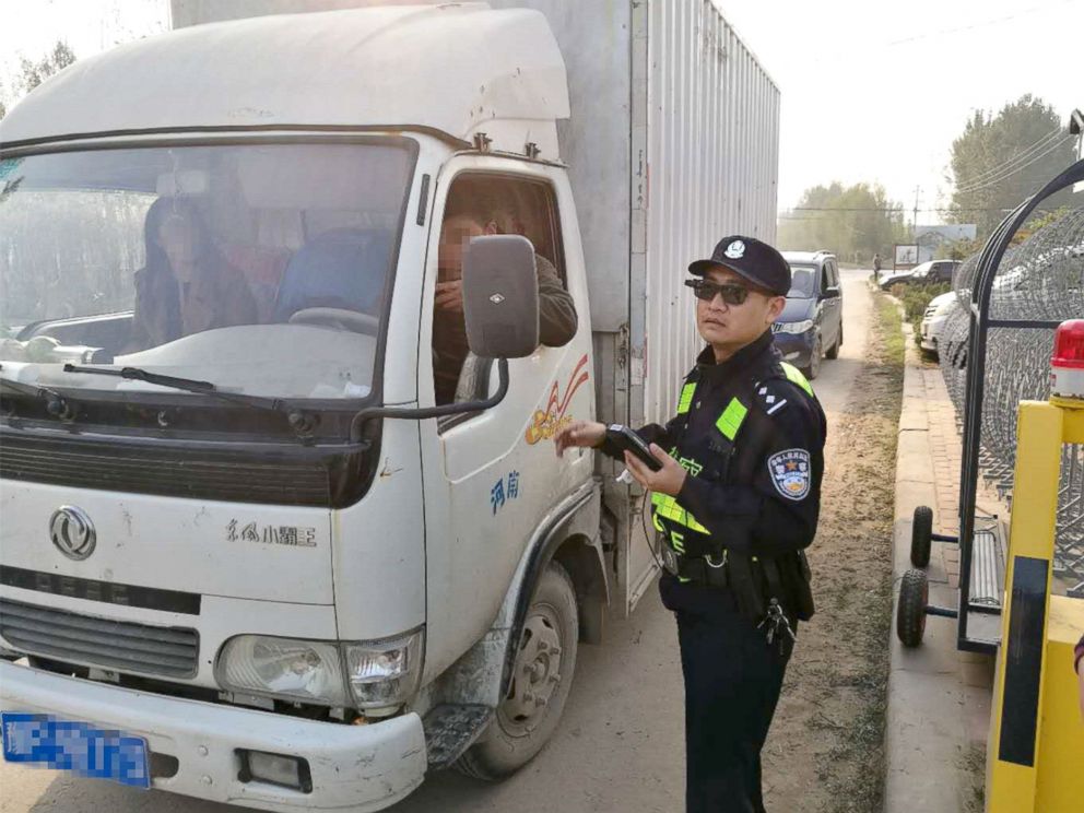 PHOTO: In this photograph provided by the glasses’ designer, LLVision Technology Co., a police officer in China wears glasses equipped with facial-recognition technology.