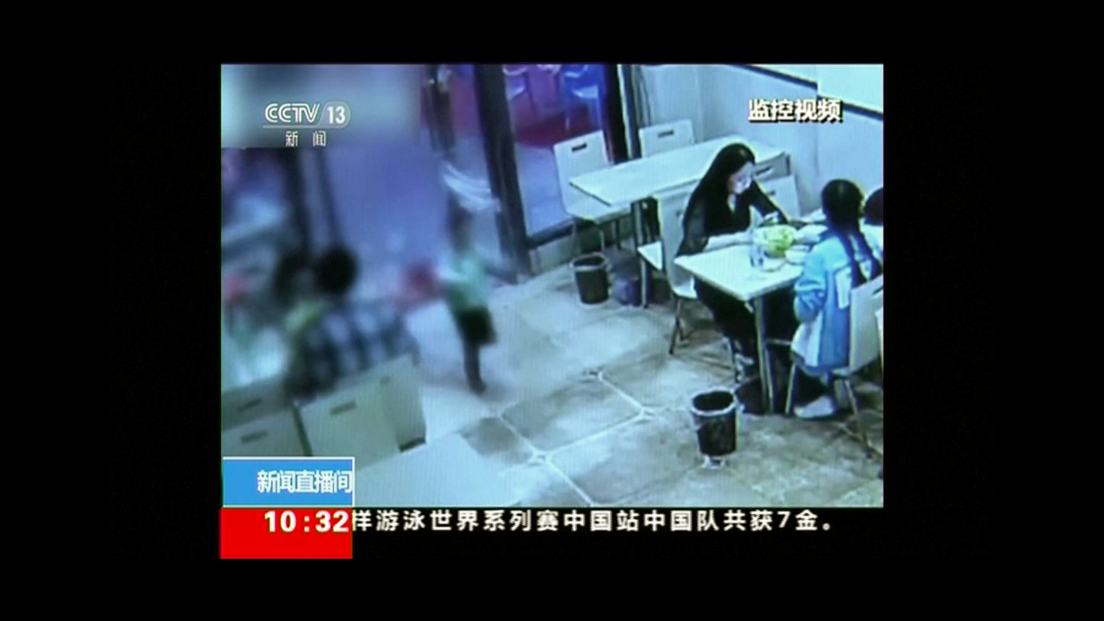 PHOTO: A small boy ran inside a restaurant and as he ran inside, the plastic strip curtain on the door hit a pregnant woman in her face, according to Chinese media.