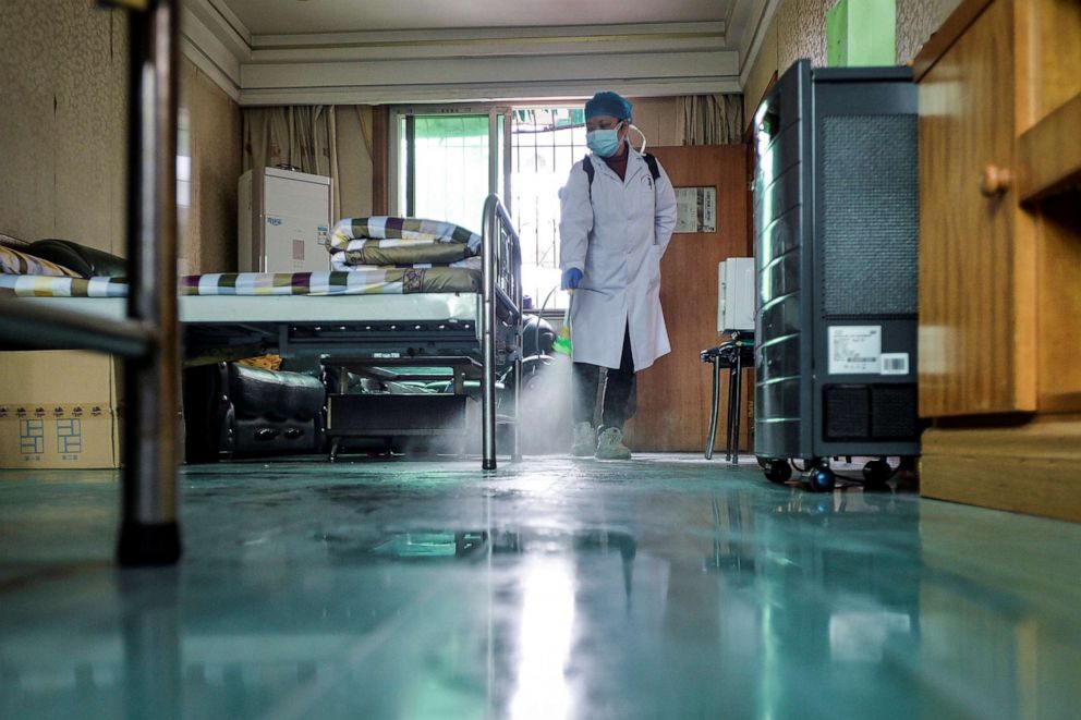 PHOTO: A doctor disinfects a room for medical staff with sanitizing equipment at a community health service center in the Qingshan district of Wuhan, Hubei province, China, Feb. 10, 2020.