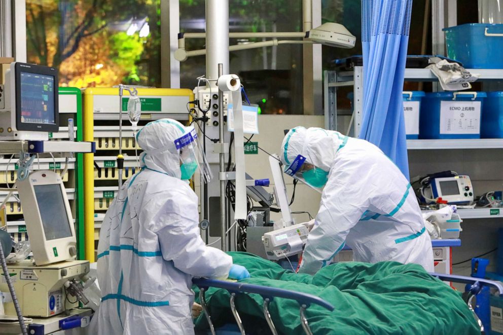 PHOTO: Medical staff in protective suits treat a patient with pneumonia caused by the new coronavirus at the Zhongnan Hospital of Wuhan University, in Wuhan, Hubei province, China, Jan. 28, 2020.