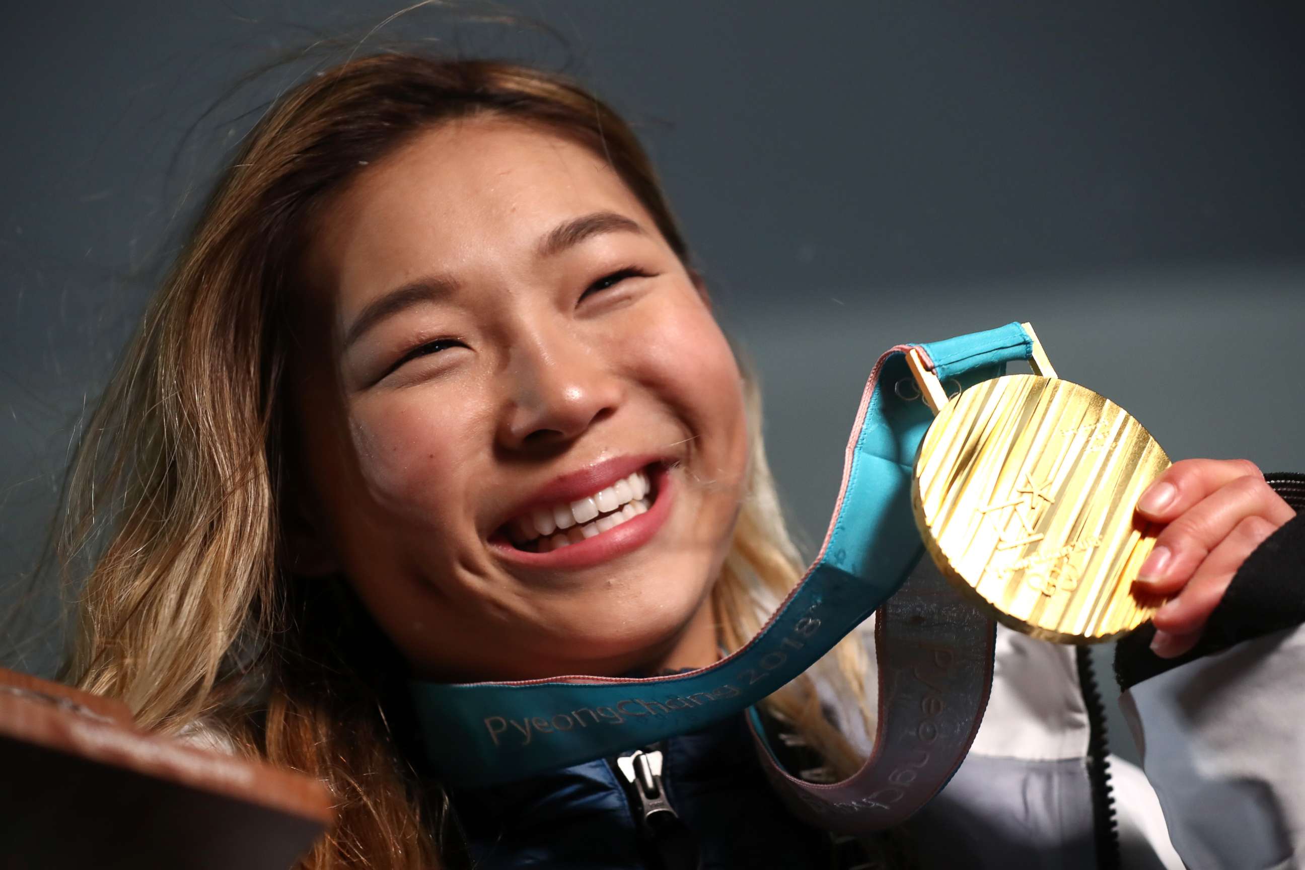 PHOTO: Gold medalist Chloe Kim of the United States poses during the medal ceremony for the Snowboard Ladies' Halfpipe Final, Feb. 13, 2018.
