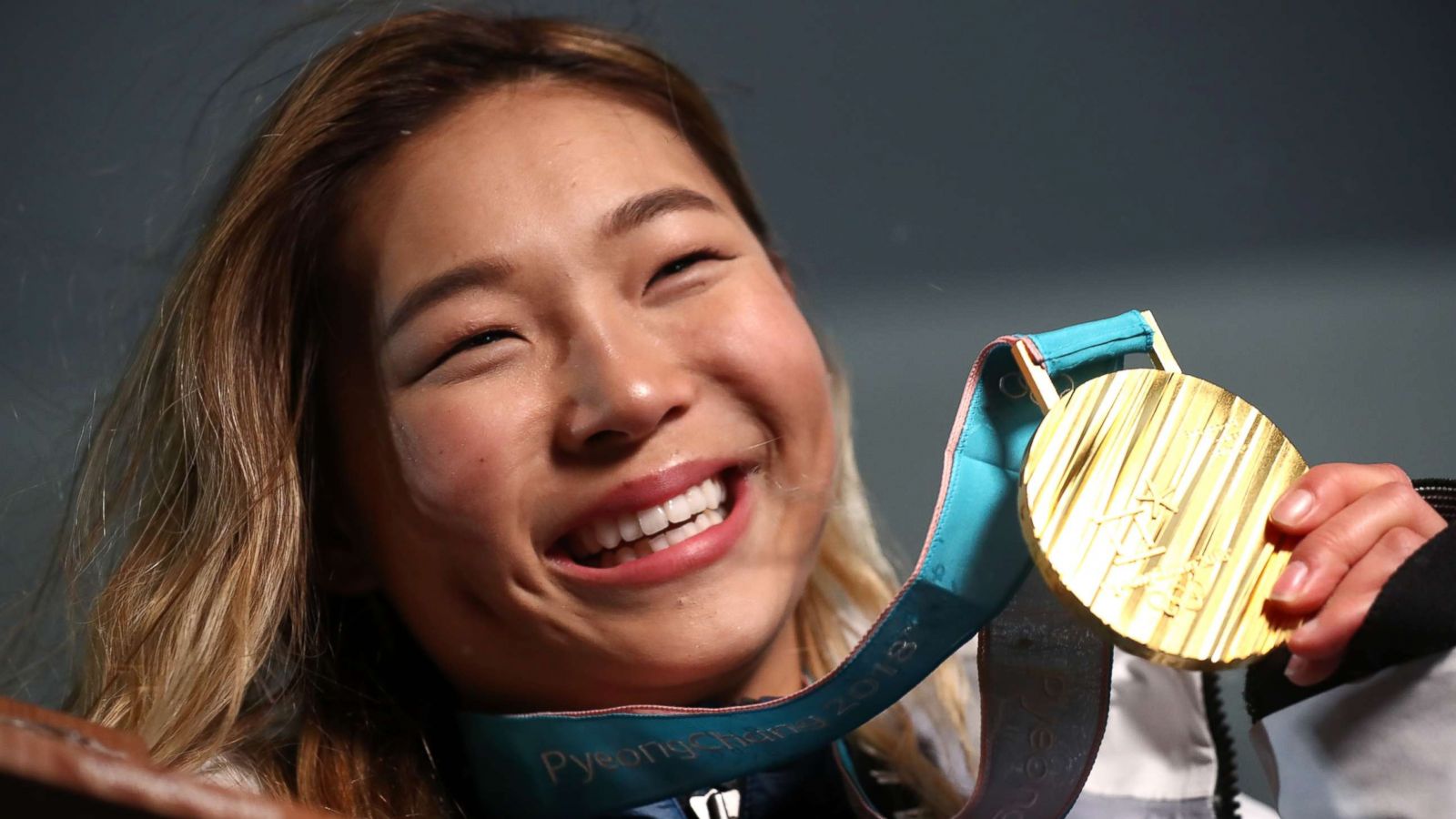 PHOTO: Gold medalist Chloe Kim of the United States poses during the medal ceremony for the Snowboard Ladies' Halfpipe Final, Feb. 13, 2018.