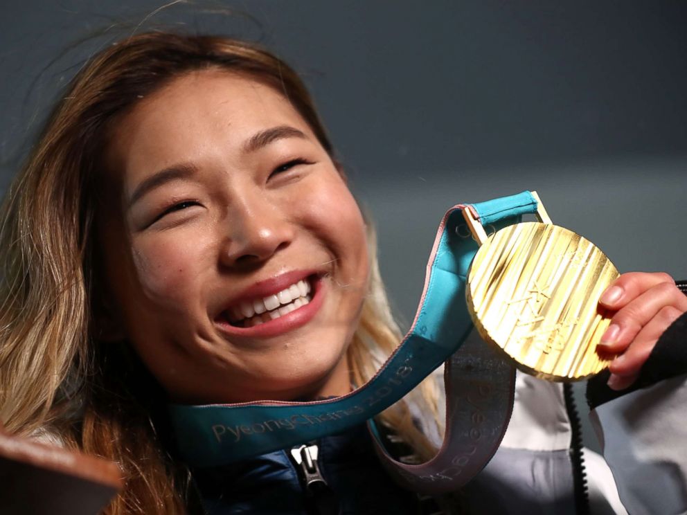 PHOTO: Gold medalist Chloe Kim of the United States poses during the medal ceremony for the Snowboard Ladies Halfpipe Final, Feb. 13, 2018.