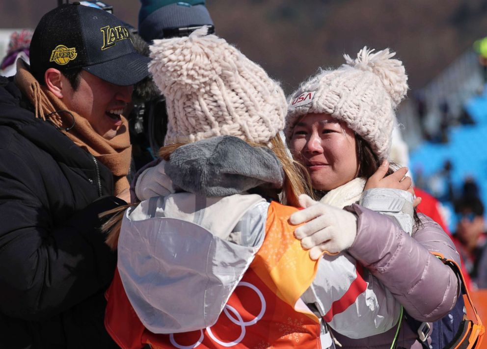 PHOTO: Chloe Kim of the U.S. celebrates her victory with her parents at the 2018 Winter Olympic Games in Pyeongchang, South Korea.