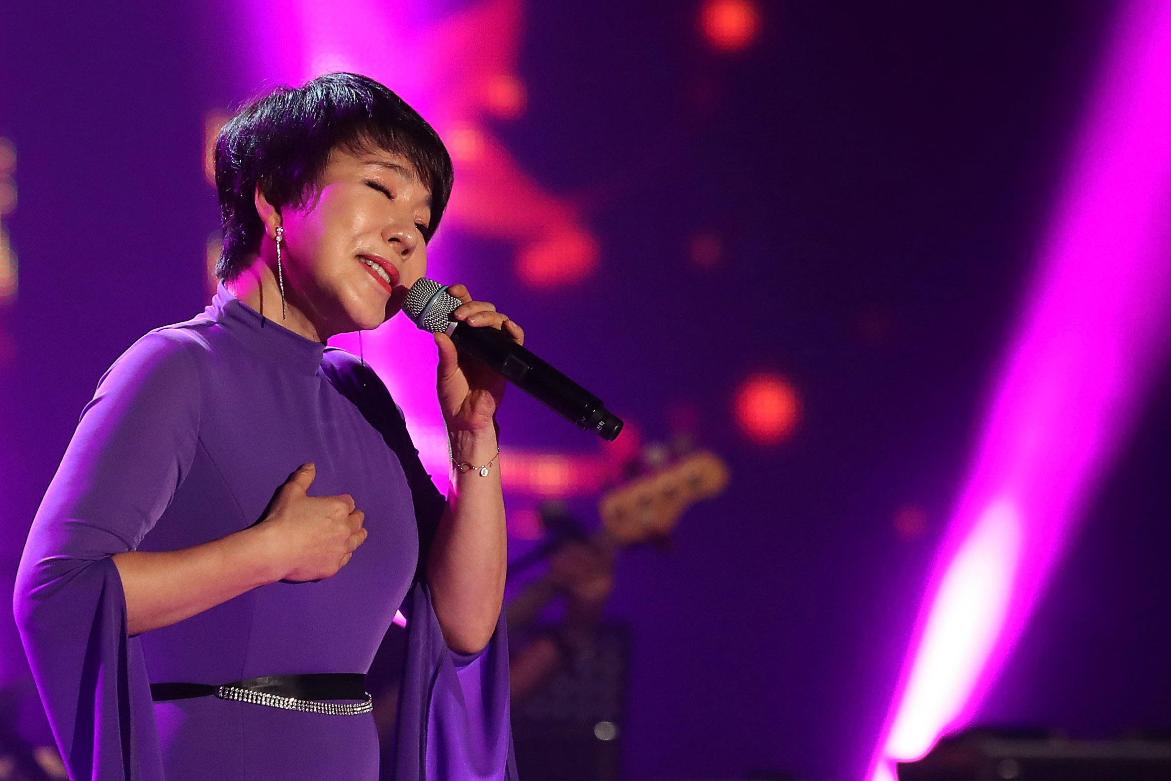 PHOTO: South Korean singer Choi Jin-Hee performs on stage during a concert, April 3, 2018, in Pyongyang, North Korea. South Korean musicians, 160 members in total performed in Pyongyang ahead of the historic inter-Korean summit scheduled for late April.