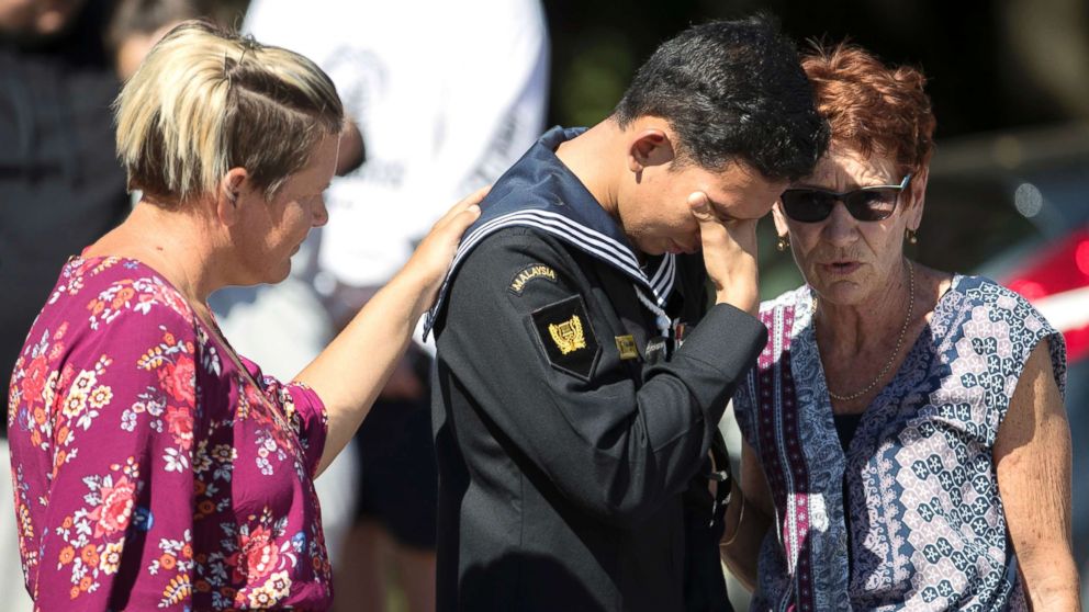 PHOTO: Abdul Iskandar, a sailor of Malaysian Royal Navy, cries after offering flowers outside the Al Noor mosque in Christchurch, New Zealand, March 19, 2019.