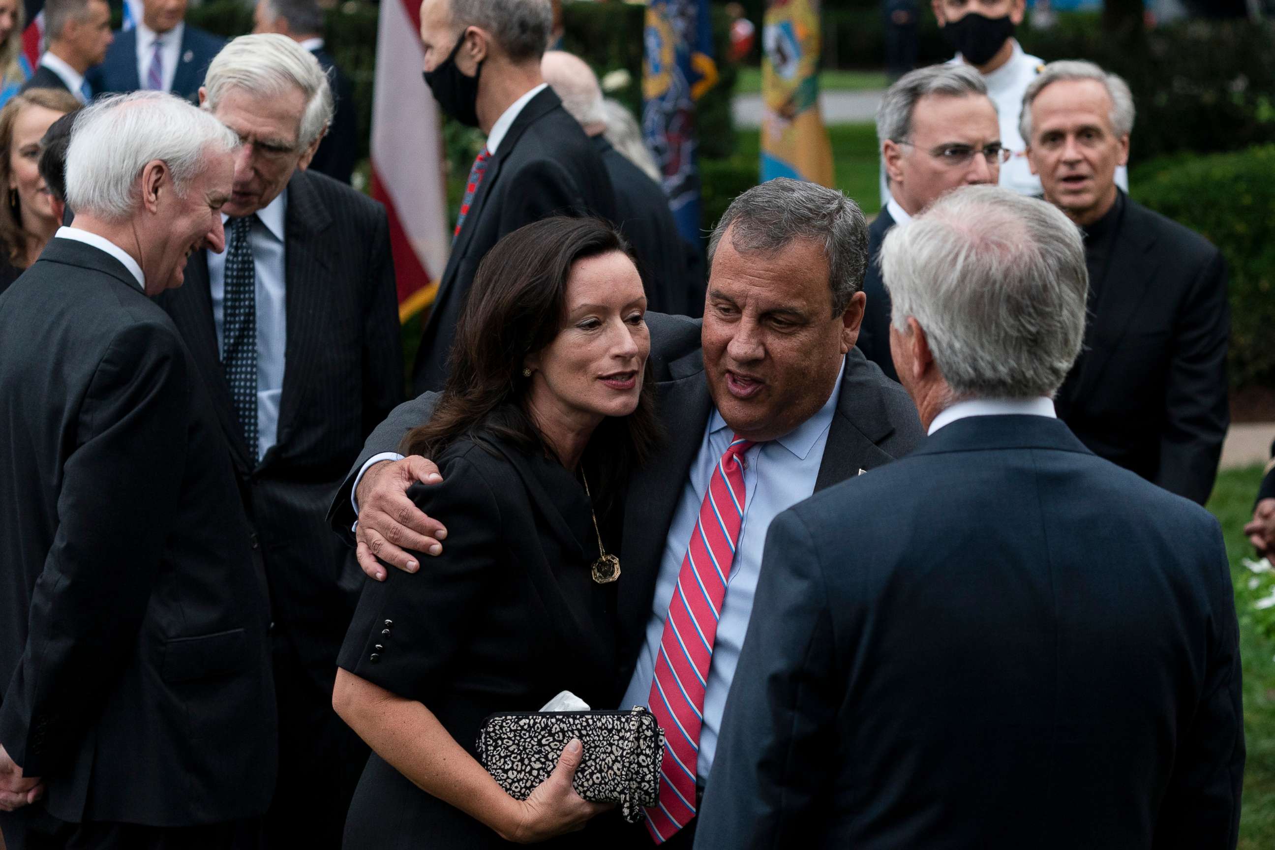 PHOTO: Former New Jersey Gov. Chris Christie speaks with others after President Donald Trump announces Judge Amy Coney Barrett as his Supreme Court nominee in the Rose Garden of the White House, in Washington, D.C., Sept. 26, 2020.