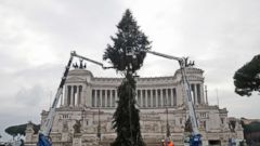 PHOTO: Cranes work around 65-ft tall fir tree placed in front of Rome's Unknown Soldier monument, Dec.3, 2018. The tree, which will be trimmed as a Christmas tree, comes from Cittiglio, near Varese, north-western Italy. 