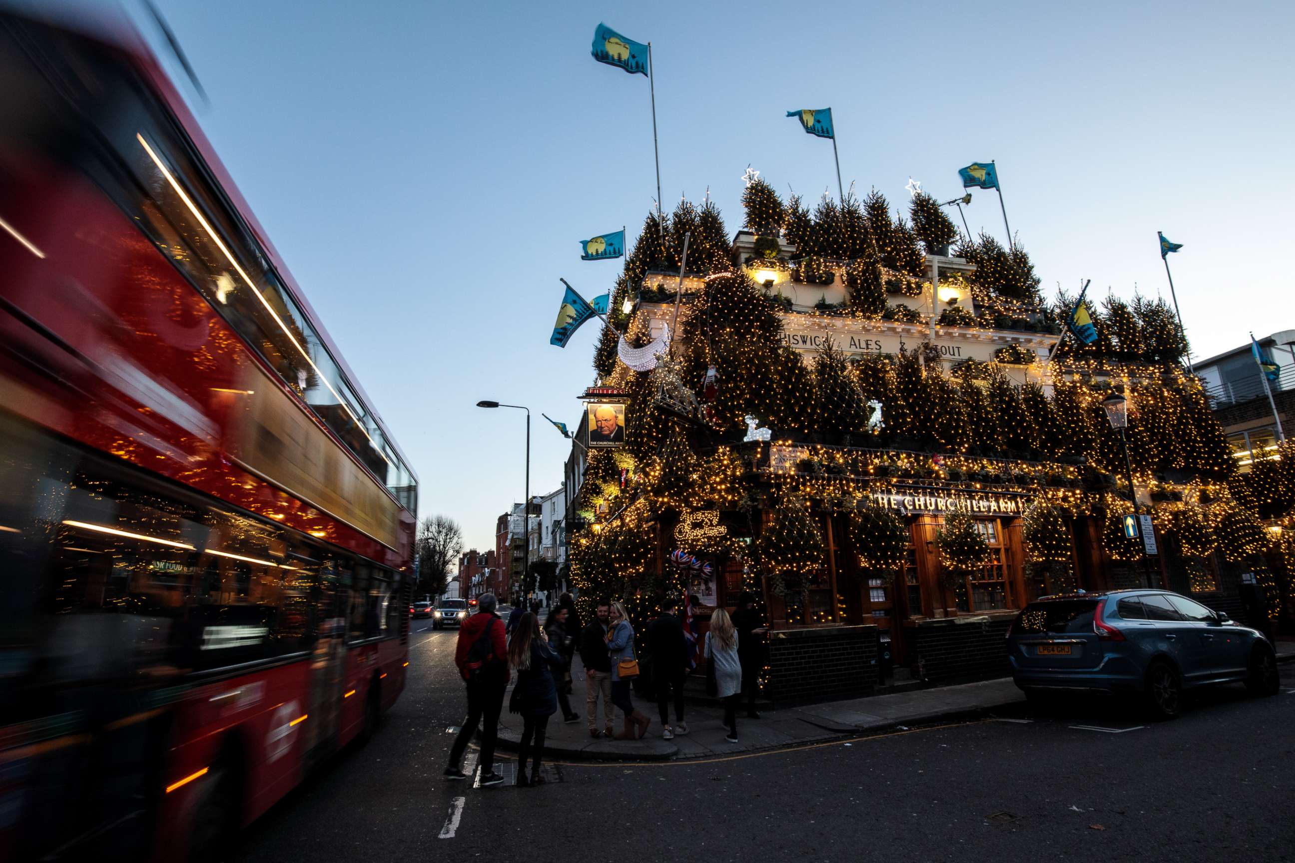 PHOTO: The Churchill Arms pub in London stands adorned with Christmas lights and conifer trees for the Christmas period, Nov. 30, 2018.