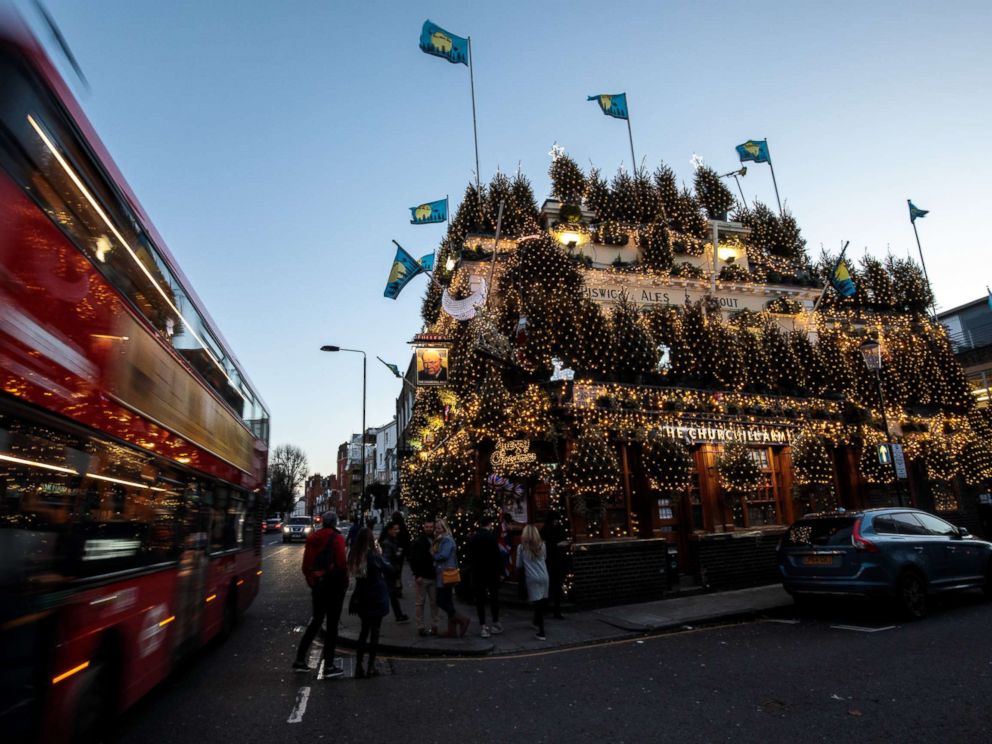 PHOTO: The Churchill Arms pub in London stands adorned with Christmas lights and conifer trees for the Christmas period, Nov. 30, 2018.