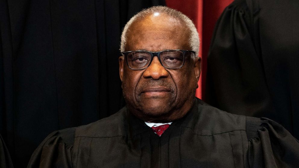 PHOTO: Associate Justice Clarence Thomas sits during a group photo of the Justices at the Supreme Court in Washington on April 23, 2021.