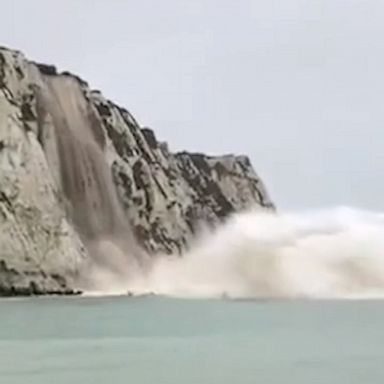 Fisherman’s footage captures the moment a section of the famous cliffs collapsed into the water.