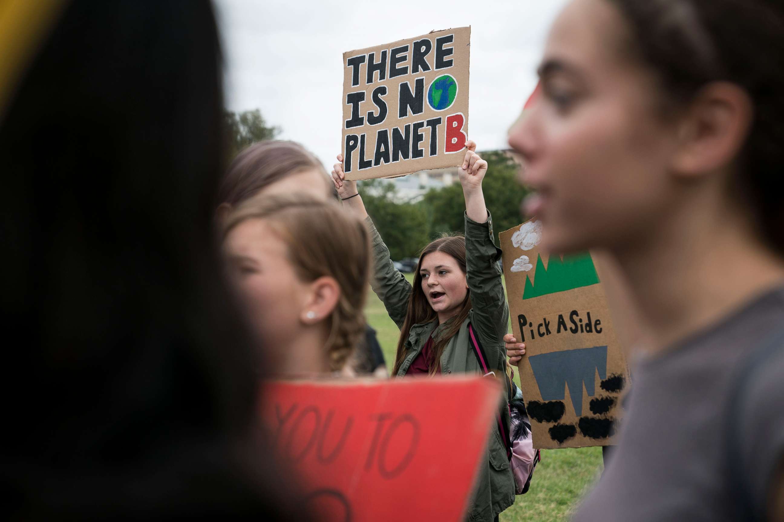 PHOTO: Student environmental advocates participate in a strike to demand action be taken on climate change outside the White House, Sept. 13, 2019, in Washington, D.C.