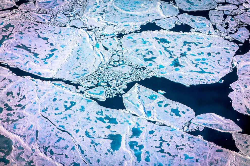 Photo: An aerial view of pancake ice and melting in the Arctic, July 19, 2022.