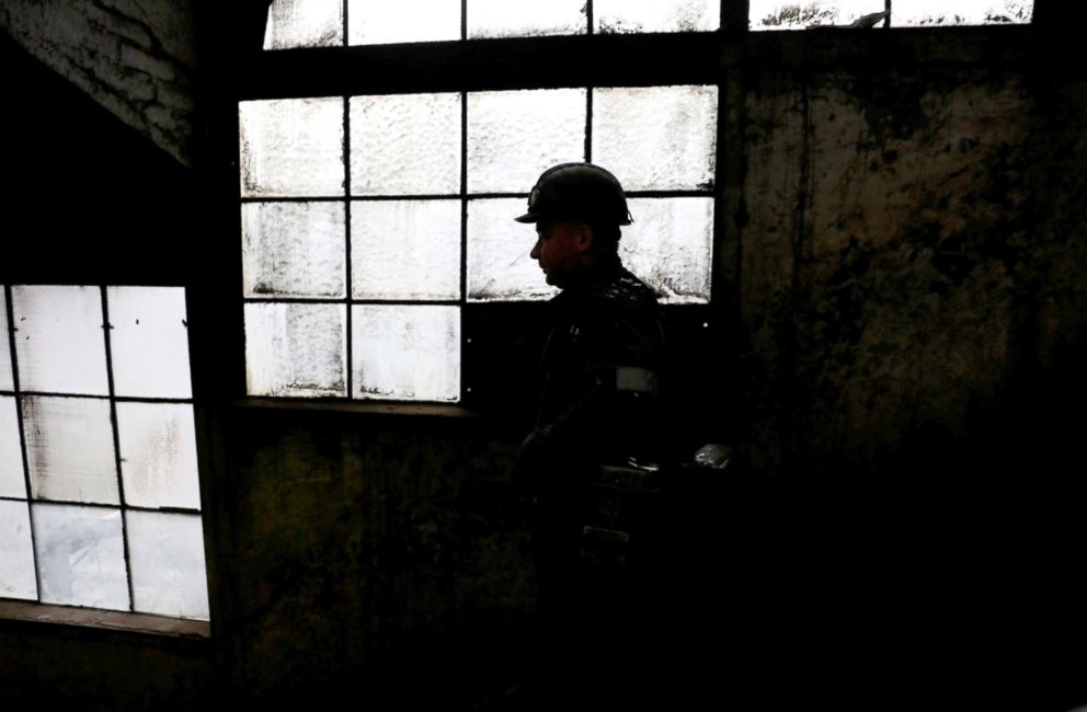 PHOTO: Miner Krzysztof Zawisza, 32 walks inside the Wieczorek mine in Nikiszowiec district in Katowice, Poland, Nov. 26, 2018.