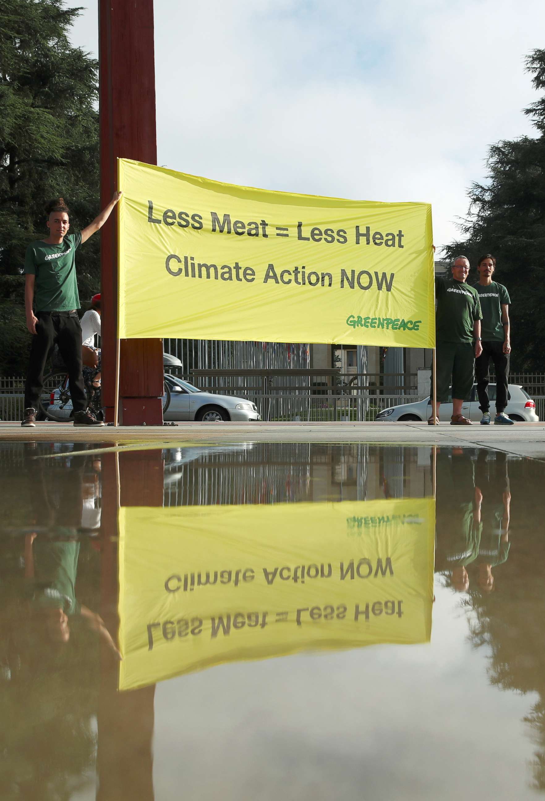 PHOTO: Greenpeace activists hold a banner in front of the United Nations before a news conference by the Intergovernmental Panel on Climate Change (IPCC), in Geneva, Switzerland, Aug. 8, 2019.