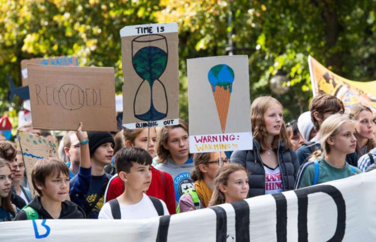 PHOTO: Demonstrators carry banners and posters on the street of June 17, in Berlin, Sept. 20, 2019.