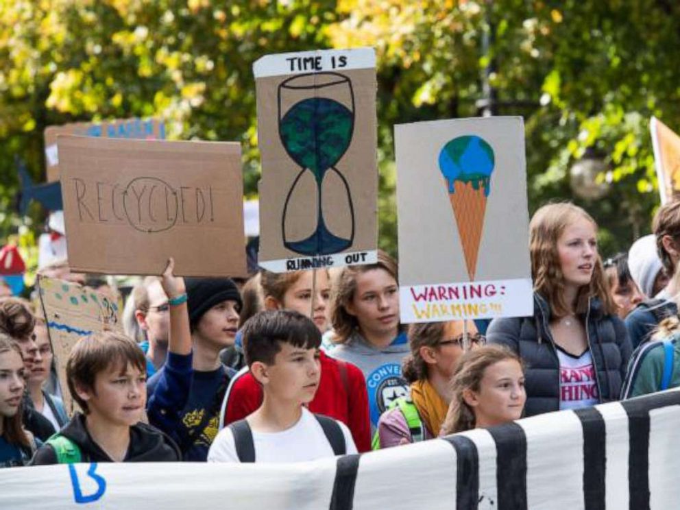 PHOTO: Demonstrators carry banners and posters on the street of June 17, in Berlin, Sept. 20, 2019.