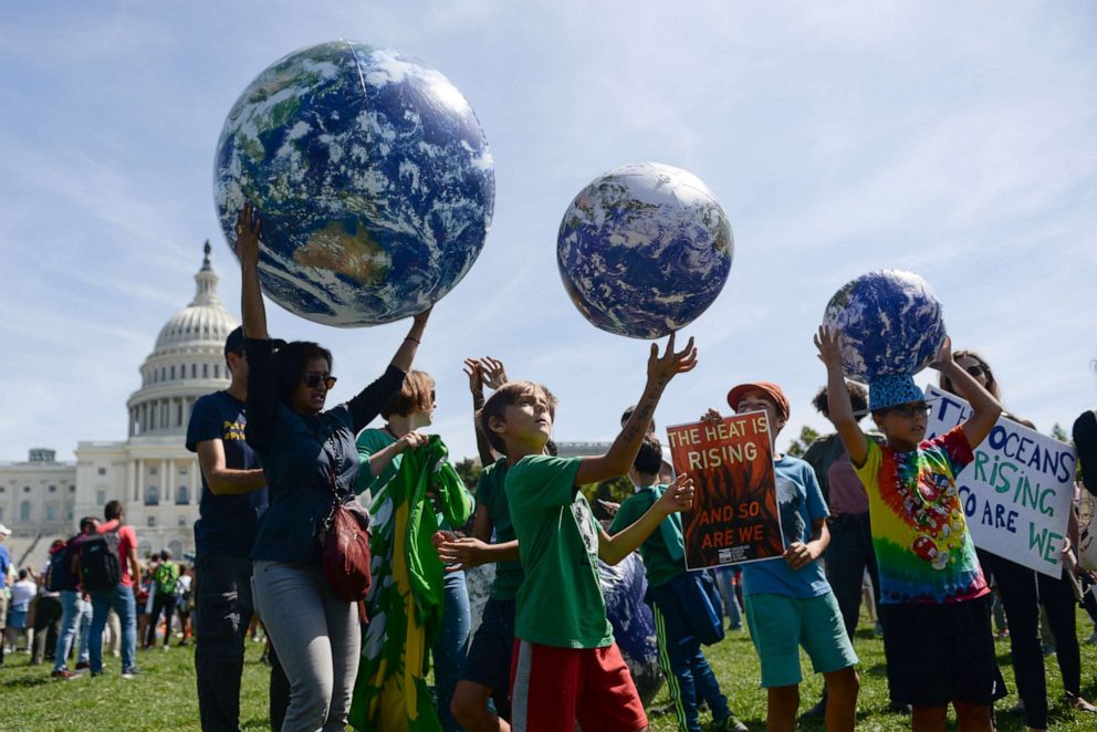 PHOTO: Young protesters participate in a rally near the U.S. Capitol as part of the D.C. Climate Strike March to demand action on climate change in Washington, September 20, 2019.