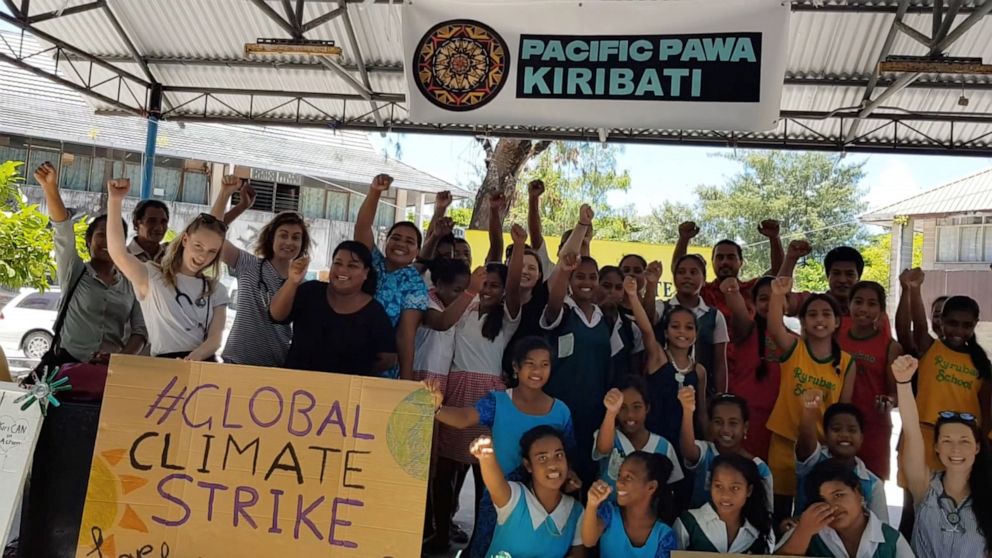 PHOTO: Students from various schools participate in a climate change protest in Tarawa, Kiribati, September 20, 2019 in this picture obtained from social media.