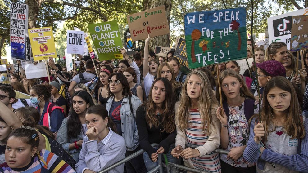 PHOTO: Children listen to speakers as they attend the Global Climate Strike on September 20, 2019, in London.