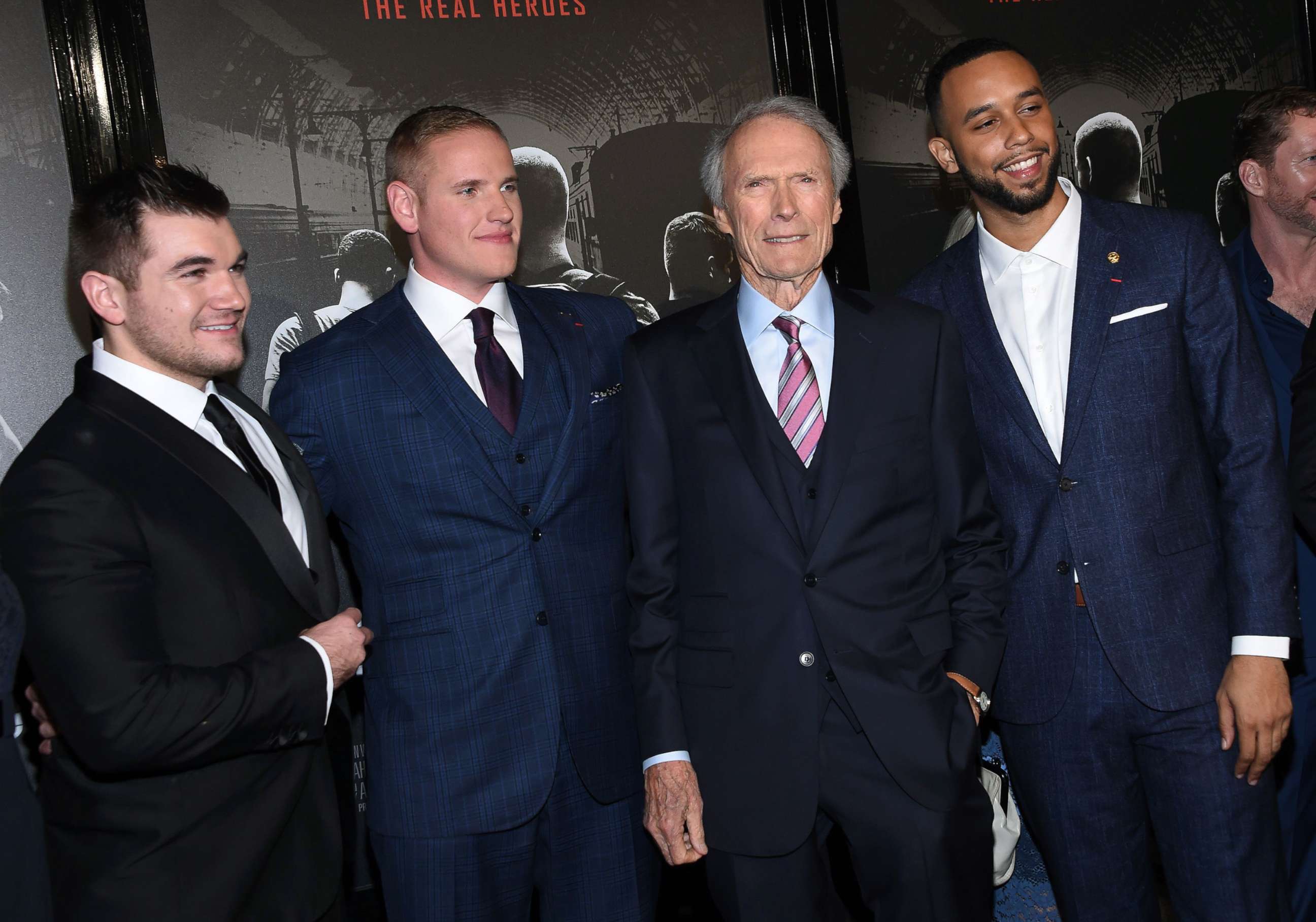 PHOTO: From left, Alek Skarlatos, Spencer Stone, director and producer Clint Eastwood and Anthony Sadler arrive for the world premiere of "The 15:17 to Paris" in Burbank, Calif., Feb. 5, 2018. 