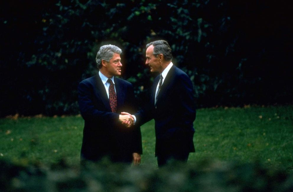 PHOTO: President George Bush and Pres-elect Bill Clinton shake hands during a stroll around the White House grounds, in a post-election visit by Clinton, Nov. 1, 1992.