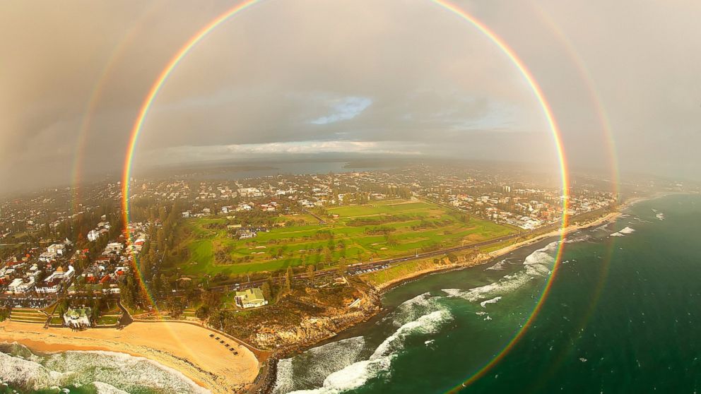 PHOTO: Aerial photographer Colin Leonhardt photographed a circular rainbow while flying around a rain shower above Cottesloe Beach in western Australia in 2013.