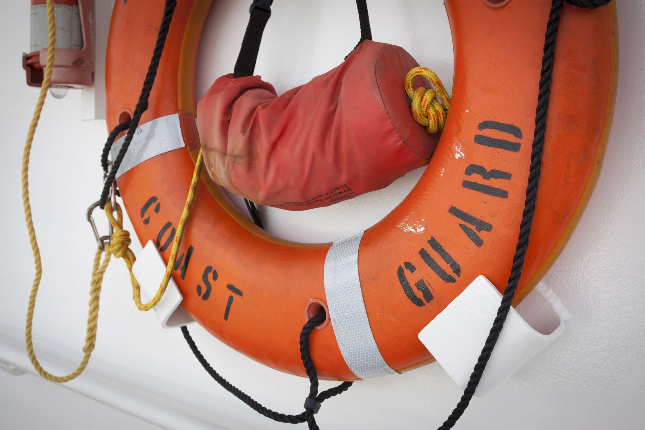 PHOTO: An orange life preserver is mounted to the wall of a United States Coast Guard boat in a stock image, May 24, 2015.