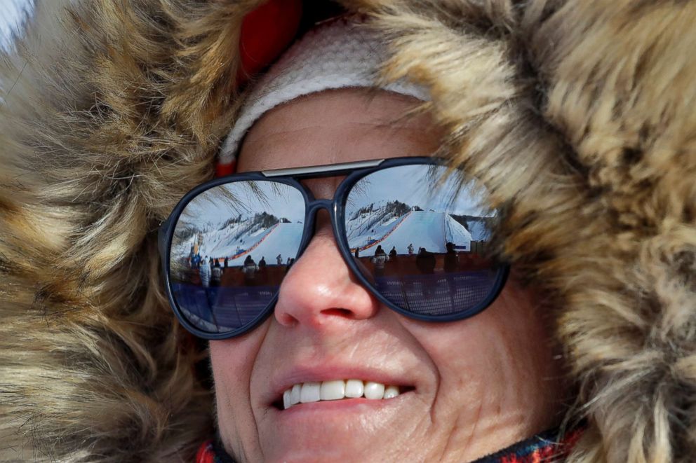 PHOTO: The snowboard runs were reflected in this mans glasses as he bundled up against the cold temperatures at the 2018 Winter Olympics in Pyeongchang, South Korea, Feb. 11, 2018.