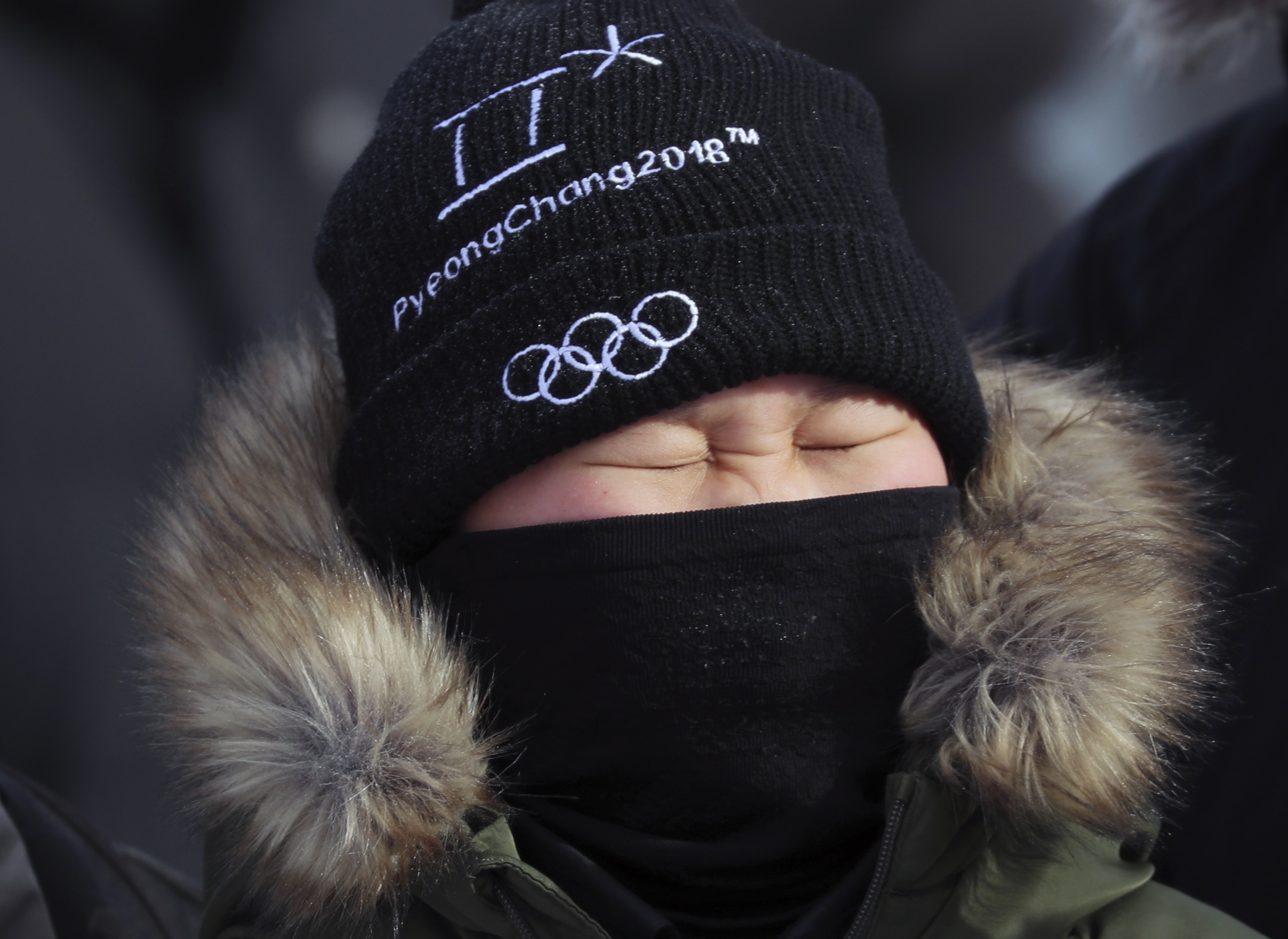 PHOTO: Spectators to the snowboarding events held at Phoenix Snow Park were bundled up against the cold, Feb. 11, 2018.