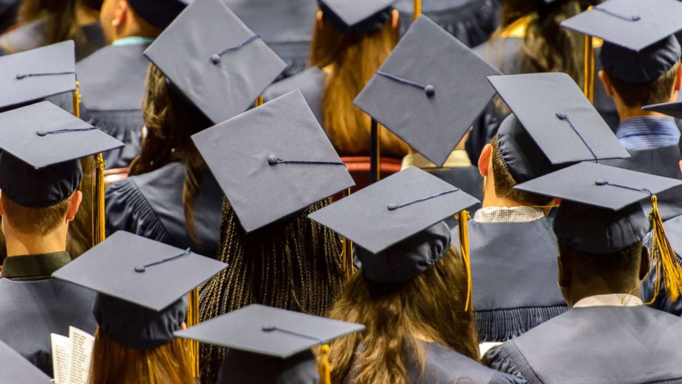 PHOTO: In this undated stock photo shows a group of graduating student wearing caps.