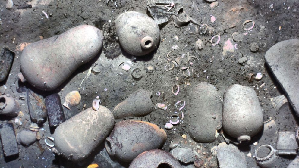 PHOTO: This November 2015 photo released Monday, May 21, 2018, by the Woods Hole Oceanographic Institution shows ceramic jars and other items from the 300-year-old shipwreck of the Spanish galleon San Jose on the floor of the Caribbean Sea near Colombia.