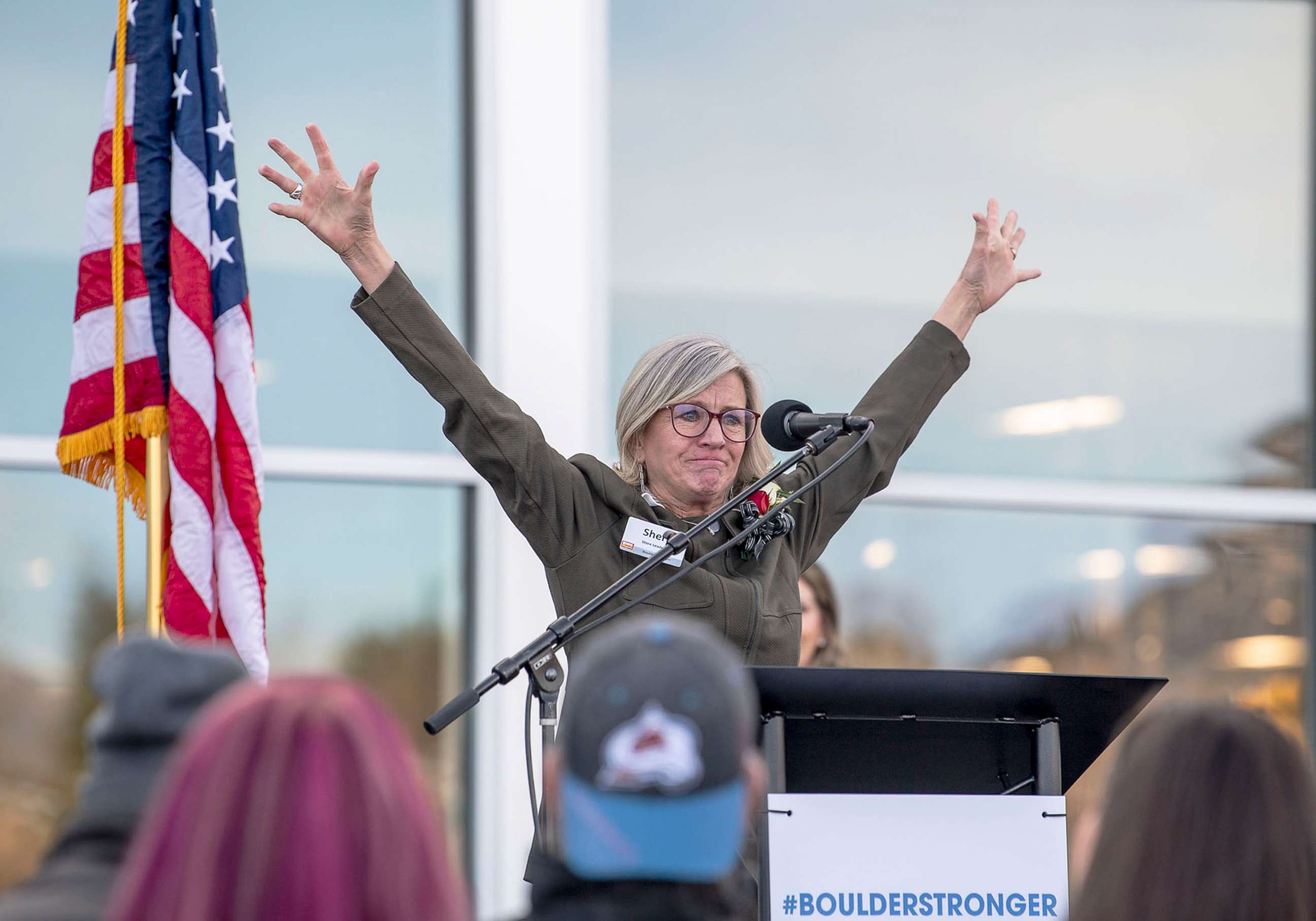 PHOTO: Store leader Sheri Bosman celebrates the reopening of a King Soopers grocery store, which was closed for nearly one year after a gunman killed 10 people there, in Boulder, Colo., Feb. 9, 2022. 