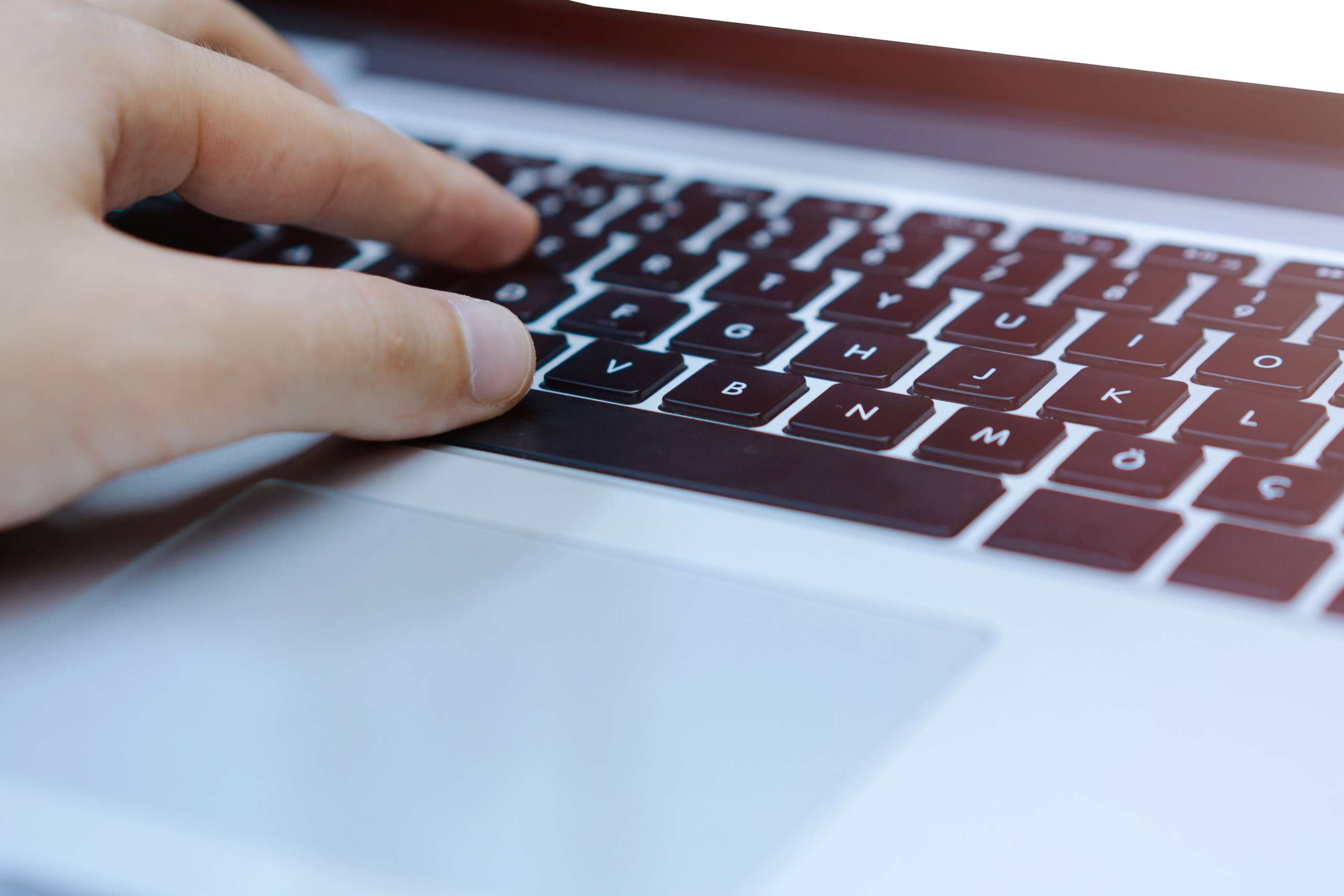 PHOTO: A man types on a laptop in this stock photo.