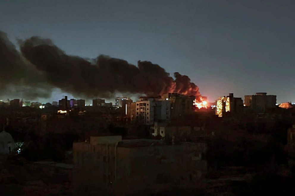 PHOTO: Smoke rises over the horizon as a fire burns after a strike in Khartoum, Sudan, April 16, 2023.