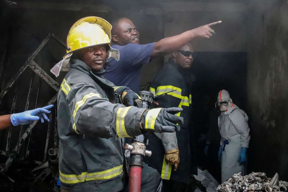 PHOTO: Rescuers attend the scene of an aircraft operated by private carrier Busy Bee which crashed in Goma, Congo, Nov. 24, 2019. 