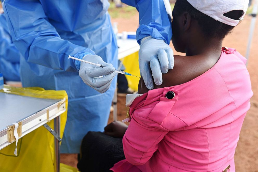 PHOTO: A Congolese health worker administers Ebola vaccine to a woman who had contact with an Ebola sufferer in the village of Mangina in North Kivu province of the Democratic Republic of Congo, Aug. 18, 2018.