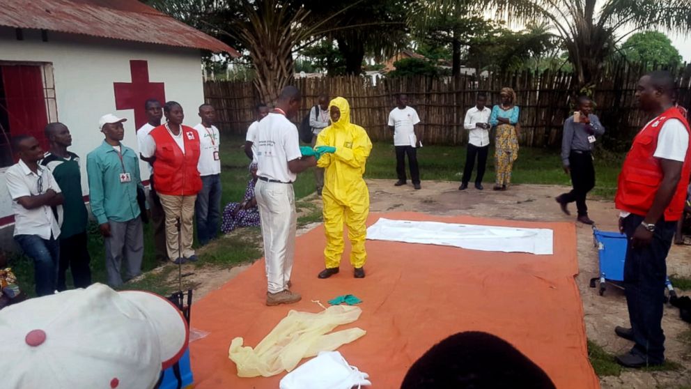 PHOTO: Members of a Red Cross team don protective clothing before heading out to look for suspected victims of Ebola, in Mbandaka, Congo, May 14, 2018.