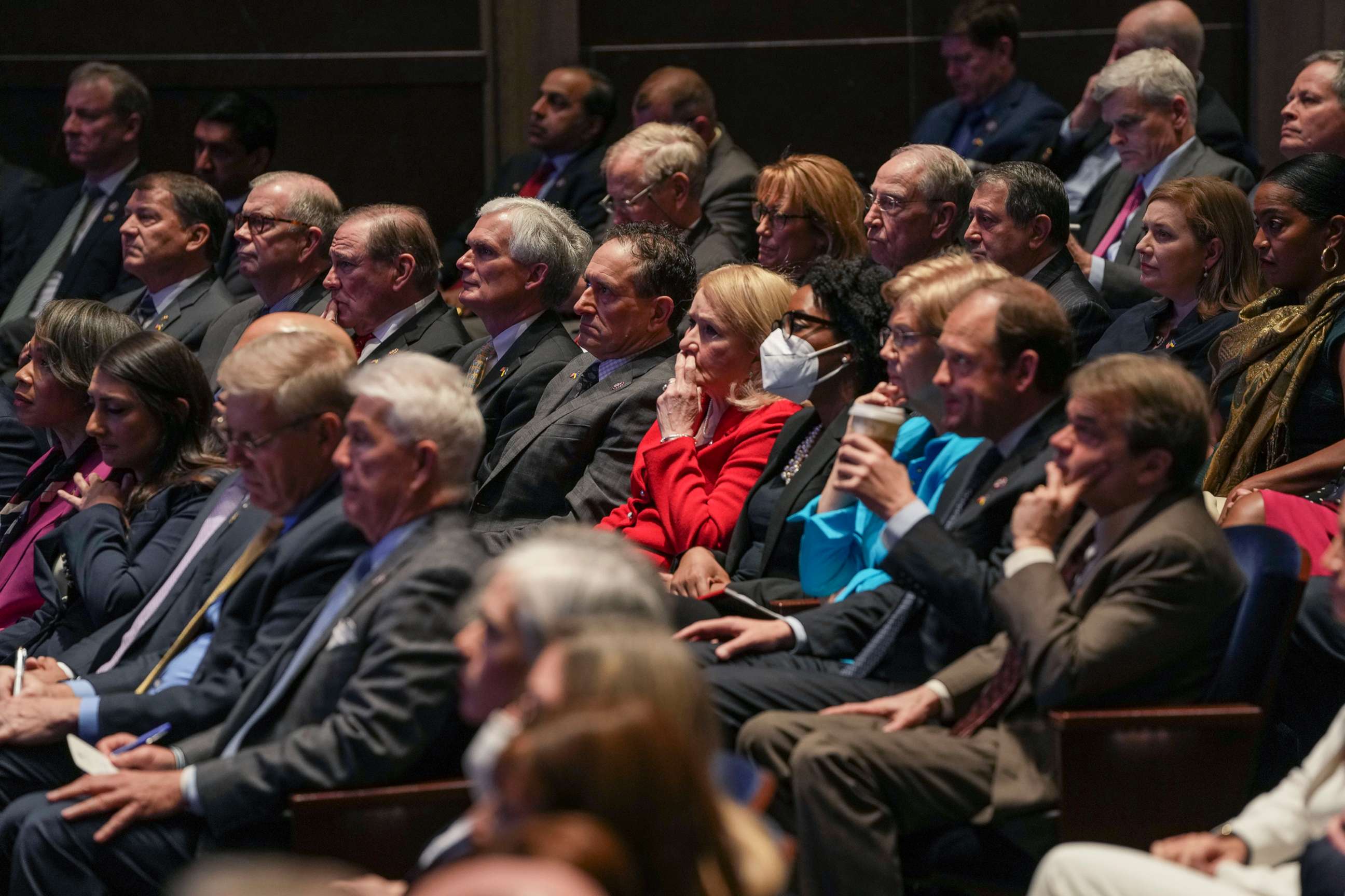 PHOTO: Members of Congress watch as President Volodymyr Zelensky of Ukraine delivers a virtual address to Congress in the U.S. Capitol Visitors Center Congressional Auditorium, March 16, 2022, in Washington, D.C.