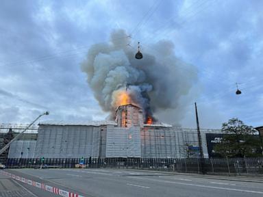 Fire rips through Old Stock Exchange building in Copenhagen as people rescue artwork