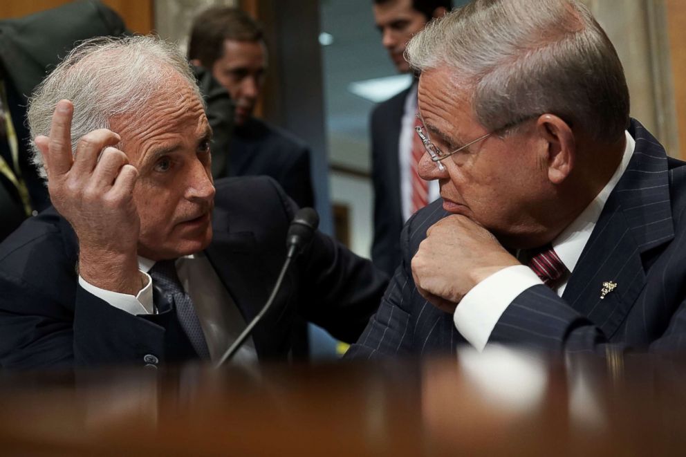 PHOTO: Sen. Bob Corker (R-TN) (L), chairman of the Senate Foreign Relations Committee, talks with ranking member Sen. Bob Menendez (D-NJ) prior to a committee meeting, April 23, 2018, on Capitol Hill.